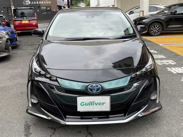トヨタ プリウス ＰＨＶ S セーフティプラス 静岡県 2018(平30)年 5.9万km アティチュードブラックマイカ ワンオーナー/モデリスタエアロ/純正9インチナビ/フルセグTV/DVD/CD/SD/MSV/BT/バックカメラ/黒革調シートカバー/プリクラッシュセーフティ/レーンキープアシスト/オートハイビーム/レーダークルーズコントロール/クリアランスソナー/前後ドライブレコーダー/ステアリングスイッチ/ステアリングヒーター/前席シートヒーター /社外18インチAW/LEDヘッドライト/LEDフォグライト/ビルトインETC/スマートキー×2/充電ケーブル有り/保証書/R5点検記録簿有