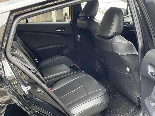トヨタ プリウス ＰＨＶ S セーフティプラス 静岡県 2018(平30)年 5.9万km アティチュードブラックマイカ ワンオーナー/モデリスタエアロ/純正9インチナビ/フルセグTV/DVD/CD/SD/MSV/BT/バックカメラ/黒革調シートカバー/プリクラッシュセーフティ/レーンキープアシスト/オートハイビーム/レーダークルーズコントロール/クリアランスソナー/前後ドライブレコーダー/ステアリングスイッチ/ステアリングヒーター/前席シートヒーター /社外18インチAW/LEDヘッドライト/LEDフォグライト/ビルトインETC/スマートキー×2/充電ケーブル有り/保証書/R5点検記録簿有