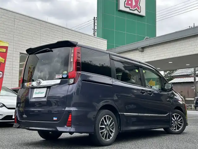 トヨタ ノア Si 東京都 2015(平27)年 4.2万km ダークバイオレットマイカメタリック ワンオーナー/純正9インチナビ/フルセグTV/DVD再生/bluetoothオーディオ/バックカメラ/両側パワースライドドア/純正ビルトインETC/前後ドライブレコーダー/LEDヘッドランプ/純正16インチAW/スマートキー×2/保証書/取扱説明書