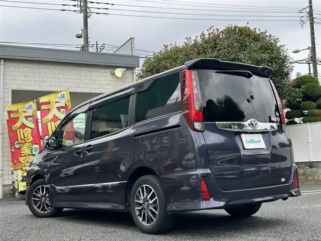 トヨタ ノア Si 東京都 2015(平27)年 4.2万km ダークバイオレットマイカメタリック ワンオーナー/純正9インチナビ/フルセグTV/DVD再生/bluetoothオーディオ/バックカメラ/両側パワースライドドア/純正ビルトインETC/前後ドライブレコーダー/LEDヘッドランプ/純正16インチAW/スマートキー×2/保証書/取扱説明書