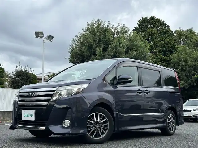 トヨタ ノア Si 東京都 2015(平27)年 4.2万km ダークバイオレットマイカメタリック ワンオーナー/純正9インチナビ/フルセグTV/DVD再生/bluetoothオーディオ/バックカメラ/両側パワースライドドア/純正ビルトインETC/前後ドライブレコーダー/LEDヘッドランプ/純正16インチAW/スマートキー×2/保証書/取扱説明書
