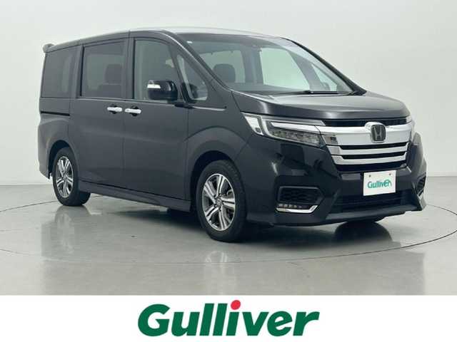 ホンダ ステップワゴン スパーダ eHEV G ホンダS 熊本県 2020(令2)年 5.9万km プレミアムスパークルブラックパール 純正10インチナビVXU-207SWi（ＣＤ・ＤＶＤ・フルセグ・ＢＴ・ＳＤ・ＵＳＢ）/純正11.6インチフリップダウンモニター/バックカメラ　/社外前方ドライブレコーダー　/ビルトインＥＴＣ２．０　/両側パワースライドドア　/ホンダセンシング/・衝突軽減ブレーキ/・アダブティブクルーズコントロール/・先行車発進お知らせ機能/・路外逸脱抑制機能/・レーンキープアシスト/・標識認識システム/・オートマチックハイビーム/横滑り防止/純正フロアマット/純正16インチAW/オートライト/LEDヘッドライト/フォグランプ/スマートキー/プッシュスタート/スペアキー1本