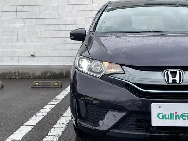 ホンダ フィット ハイブリット Fパッケージ 宮崎県 2015(平27)年 10.7万km ルーセブラックM ワンオーナー/プッシュスタート/スマートキー/純正オーディオ/・CD・USB・AM・FM/ETC/LEDヘッドライト/オートライト/純正フロアマット/純正ドアバイザー/電動格納ミラー