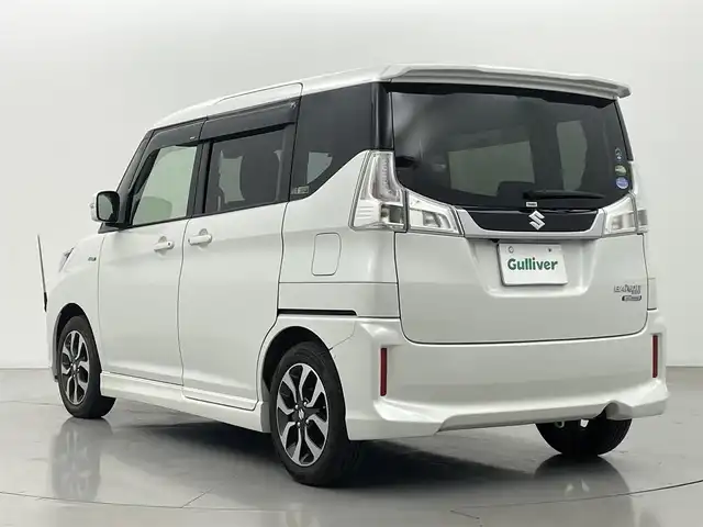 スズキ ソリオ バンディット HV MV Dカメラ ブレーキS 熊本県 2016(平28)年 6.4万km ピュアホワイトP ワンオーナー/純正8インチナビCN-RZ82/(CD/DVD/BT/フルセグ/USB)/バックカメラ/衝突軽減ブレーキ/レーンキープアシスト/両側パワースライドドア/運転席シートヒーター/クルーズコントロール/ビルトインETC/アイドリングストップ/横滑り防止/オートライト/フォグランプ/LEDヘッドライト/スマートキー/プッシュスタート/スペアキー1本/保証書