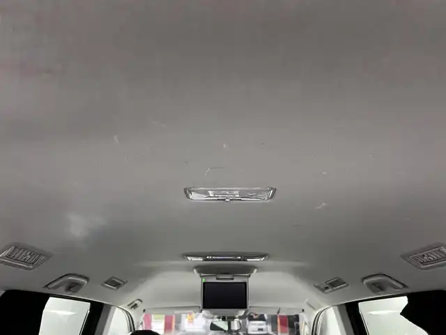 トヨタ ヴォクシー ZS 煌 愛知県 2011(平23)年 13.5万km ボルドーマイカメタリック メモリナビ/（AM/FM/CD/DVD/TV）/バックカメラ/フリップダウンモニター/ワンセグテレビ/パドルシフト/オートライト/ドアバイザー/プッシュスタート/スマートキー/純正フロアマット/レザーシートカバー付