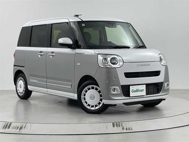 ダイハツ ムーヴ キャンバス ストライプス G 埼玉県 2024(令6)年 0.7万km シャイニングホワイトパール/スムーズグレーマイカメタリック 社外７インチナビ/全方位カメラ/クルーズコントロール/シートヒーター/衝突軽減システム/両側パワースライドドア/パーキングブレーキ/パーキングセンサー/ステアリングリモコン/社外フロアマット/スマートキー