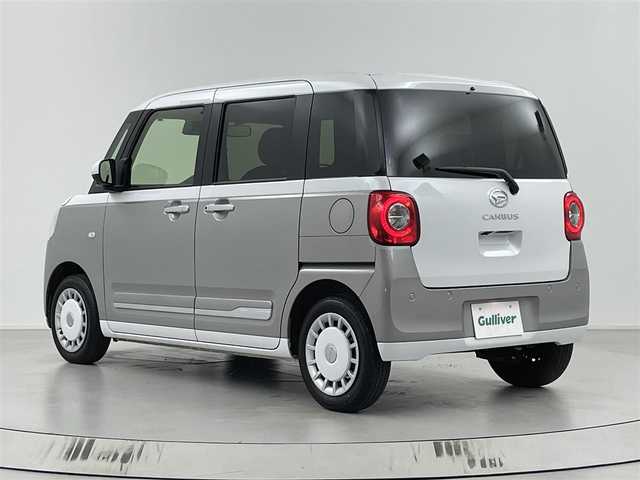 ダイハツ ムーヴ キャンバス ストライプス G 埼玉県 2024(令6)年 0.7万km シャイニングホワイトパール/スムーズグレーマイカメタリック 社外７インチナビ/全方位カメラ/クルーズコントロール/シートヒーター/衝突軽減システム/両側パワースライドドア/パーキングブレーキ/パーキングセンサー/ステアリングリモコン/社外フロアマット/スマートキー