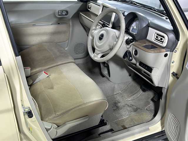 スズキ ラパン X 沖縄県 2016(平28)年 8.5万km シフォンアイボリーメタリック 禁煙車　/県外仕入れ　/８インチ社外ナビ/【ＣＤ／ＤＶＤ／フルセグＴＶ／ＢＴ】　/ＥＴＣ　/Ｄ席シートヒーター/横滑り防止装置　/衝突被害軽減システム/１４インチ純正アルミ　/オートライト　　/スマートキー