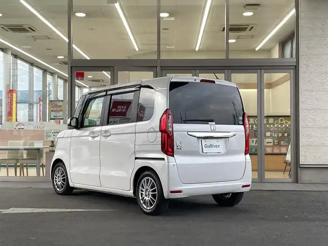 ホンダ Ｎ ＢＯＸ G L ターボ ホンダセンシング 埼玉県 2019(令1)年 4.2万km プラチナホワイトパール 禁煙車/Honda SENSING/純正メモリナビ/　　Bluetooth/CD/iPod/バックカメラ/両側パワースライドドア/アダプティブクルーズコントロール/LEDオートライト、オートハイビーム/アイドリングストップ/パドルシフト/充電用USBジャック/ロールサンシェイド(リアドア)/横滑り防止装置/車線維持支援システム/スペアキー/取扱説明書/保証書/純正夏タイヤ積込