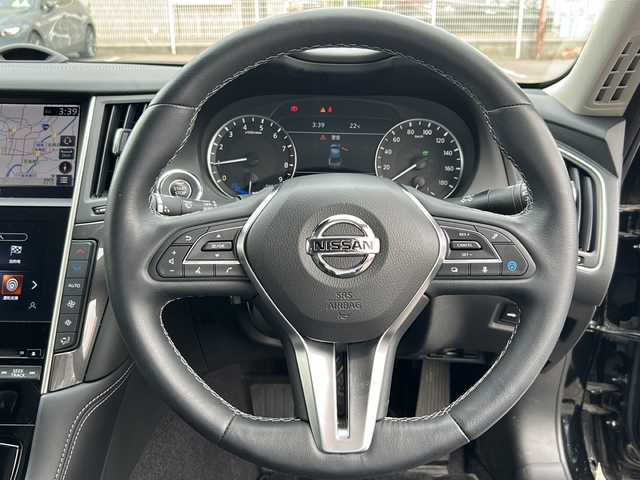 日産 スカイライン ハイブリッド GT 岐阜県 2020(令2)年 0.7万km スーパーブラック /ワンオーナー//メーカー純正ナビ/（フルセグTV/AM/FM/NissanConnectServises）//プロパイロット2.0/（車速・車間制御機能）/（車線維持機能）/（車線変更支援機能）/（追い越し支援機能）/（ルート走行支援機能）//前方衝突予測警報//後側方車両検知警報//後側方衝突防止支援システム//車線逸脱警報//車線逸脱防止支援システム//後退時衝突防御支援システム//踏み間違い衝突防止アシスト//標識探知機能//ヘッドアップディスプレイ//アクティブノイズコントロール//アラウンドビューモニター//バックカメラ//ETC//アクセサリーソケット//USBソケット//外部機器入力端子//取り扱い説明書//保証書