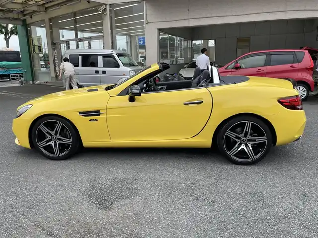 メルセデス・ベンツ ＳＬＣ１８０ スポーツ ファイナルED 神奈川県 2020(令2)年 1.3万km サンイエロー マジックスカイコントロール/専用ハーフレザーシート/AMG18インチAW/レーダーセーフティパッケージ/純正メモリーナビ・地デジTV/純正CD/DVD/USB/BT再生/バックモニター/ETC(DSRC)/エアスカーフ/パワーシート/シートヒーター/レーダークルーズコントロール/衝突軽減ブレーキ/LKA/BSM/LEDヘッドライト/コーナーセンサー/ドライブレコーダー/パドルシフト/アイドリングストップ/プッシュスタート/スマートキー×2/純正フロアマット/R3/4/5年ディーラー整備記録/保証書・取説あり
