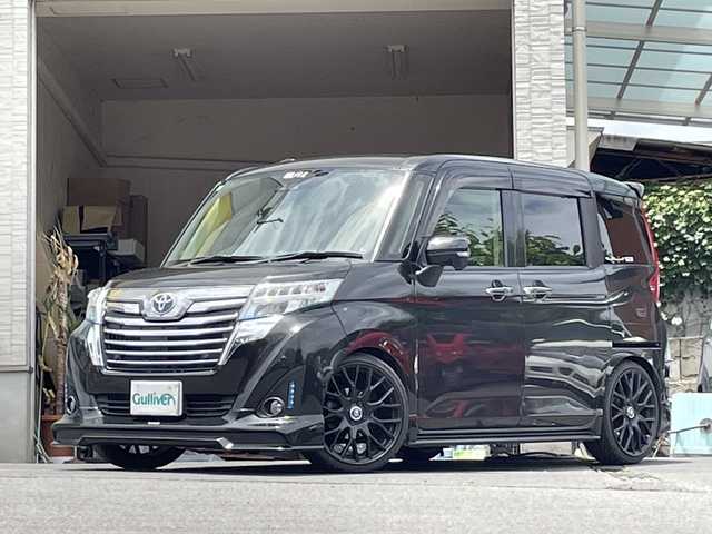 トヨタ ルーミー カスタムG－T 大分県 2018(平30)年 8.3万km ブラックマイカメタリック 両側パワースライドドア/TRDエアロ　F.S.R/シートカバー/柿本マフラー/社外エアクリ/タナベタワーバー/追加メーター/社外18インチアルミホイール/社外ETC/社外ドラレコ/純正LEDヘッドライト/オートライト/純正フロアマット/純正フリップダウンモニター/バックカメラ