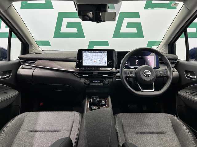 日産 オーラ G 鹿児島県 2024(令6)年 1.4万km オーロラフレアブルーパール 純正ナビ/(フルセグ/HDMI)/デジタルインナーミラー/ビルトインETC2.0/全方位カメラ/電動パーキングブレーキ/オートブレーキホールド/革巻きステアリング/ステアリングリモコン/LEDヘッドライト/フロントフォグランプ/BOSEパーソナルプラスサウンドシステム/インテリジェント エマージェンシーブレーキ/踏み間違い衝突防止アシスト/標識検知機能（進入禁止標識検知、最高速度標識検知、一時停止標識検知）/インテリジェント FCW（前方衝突予測警報）/LDW（車線逸脱警報）/インテリジェント DA（ふらつき警報）/インテリジェント LI （車線逸脱防止支援システム）/フロント&バックソナー/エマージェンシーストップシグナル/インテリジェント BSI（後側方衝突防止支援システム）/BSW（後側方車両検知警報）/RCTA（後退時車両検知警報）/車両接近通報装置