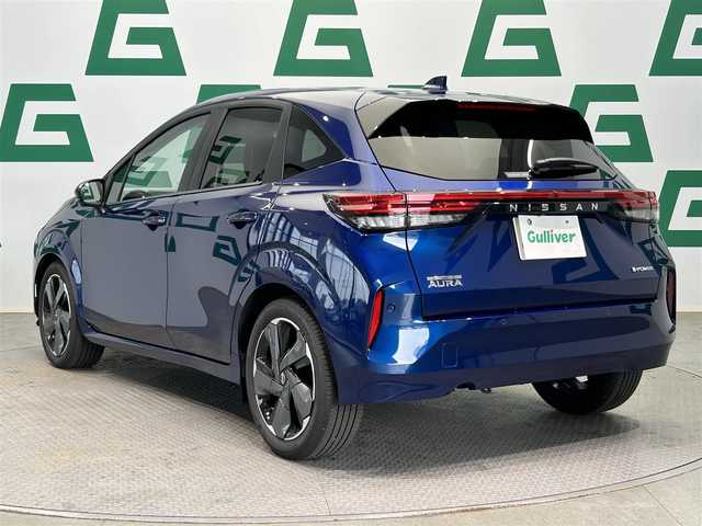 日産 オーラ G 鹿児島県 2024(令6)年 1.4万km オーロラフレアブルーパール 純正ナビ/(フルセグ/HDMI)/デジタルインナーミラー/ビルトインETC2.0/全方位カメラ/電動パーキングブレーキ/オートブレーキホールド/革巻きステアリング/ステアリングリモコン/LEDヘッドライト/フロントフォグランプ/BOSEパーソナルプラスサウンドシステム/インテリジェント エマージェンシーブレーキ/踏み間違い衝突防止アシスト/標識検知機能（進入禁止標識検知、最高速度標識検知、一時停止標識検知）/インテリジェント FCW（前方衝突予測警報）/LDW（車線逸脱警報）/インテリジェント DA（ふらつき警報）/インテリジェント LI （車線逸脱防止支援システム）/フロント&バックソナー/エマージェンシーストップシグナル/インテリジェント BSI（後側方衝突防止支援システム）/BSW（後側方車両検知警報）/RCTA（後退時車両検知警報）/車両接近通報装置