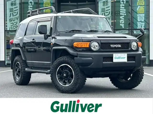 トヨタ ＦＪクルーザー ブラックカラーパッケージ 岡山県 2013(平25)年 10.7万km ブラック/ホワイト 登録時走行距離106544km/純正ナビ/フルセグTV(AM.FM.CD.DVD.TV.BT)/バックカメラ/ETC/ドライブレコーダー/横滑り防止装置/クルーズコントロール/17インチ純正AW/純正フロアマット/ルーフラック/ドアバイザー/寒冷地仕様