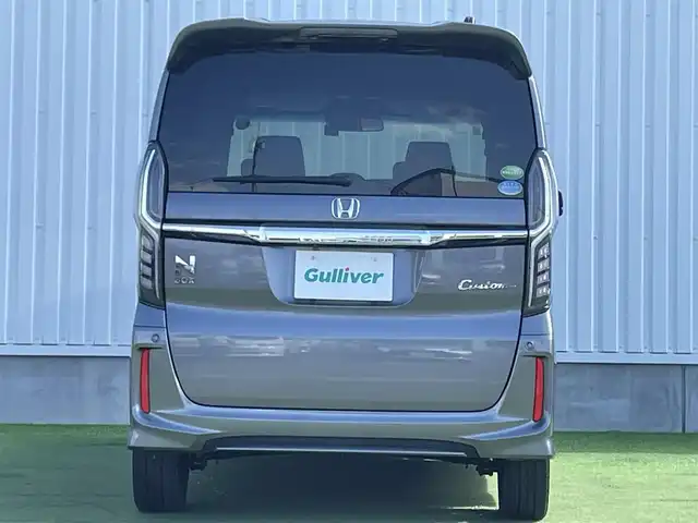 ホンダ Ｎ ＢＯＸ カスタム G EX ターボ ホンダセンシング 香川県 2017(平29)年 2.5万km シャイニンググレーM 登録時走行距離：24320km/ホンダセンシング/→衝突軽減ブレーキ/→渋滞時追走機能付きクルーズコントロール/→路外逸脱抑制機能/純正7インチナビ/→フルセグTV/→ＣＤ／ＤＶＤ/→Bluetooth/革巻きステアリング/ステアリングリモコン/純正15インチAW/スマートキー/プッシュスタート/純正フロアマット/電動格納ウィンカーミラー