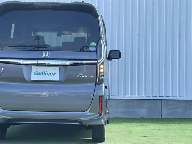 ホンダ Ｎ ＢＯＸ カスタム G EX ターボ ホンダセンシング 香川県 2017(平29)年 2.5万km シャイニンググレーM 登録時走行距離：24320km/ホンダセンシング/→衝突軽減ブレーキ/→渋滞時追走機能付きクルーズコントロール/→路外逸脱抑制機能/純正7インチナビ/→フルセグTV/→ＣＤ／ＤＶＤ/→Bluetooth/革巻きステアリング/ステアリングリモコン/純正15インチAW/スマートキー/プッシュスタート/純正フロアマット/電動格納ウィンカーミラー