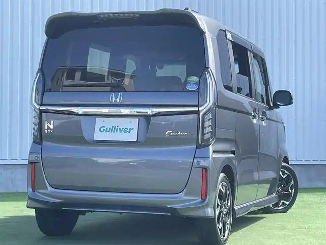 ホンダ Ｎ ＢＯＸ カスタム G EX ターボ ホンダセンシング 香川県 2017(平29)年 2.5万km シャイニンググレーM 登録時走行距離：24320km/ホンダセンシング/→衝突軽減ブレーキ/→渋滞時追走機能付きクルーズコントロール/→路外逸脱抑制機能/純正7インチナビ/→フルセグTV/→ＣＤ／ＤＶＤ/→Bluetooth/革巻きステアリング/ステアリングリモコン/純正15インチAW/スマートキー/プッシュスタート/純正フロアマット/電動格納ウィンカーミラー