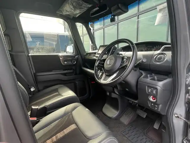 ホンダ Ｎ ＢＯＸ カスタム G EX ターボ ホンダセンシング 香川県 2017(平29)年 2.5万km シャイニンググレーM 登録時走行距離：24320km/ホンダセンシング/→衝突軽減ブレーキ/→渋滞時追走機能付きクルーズコントロール/→路外逸脱抑制機能/純正7インチナビ/→フルセグTV/→ＣＤ／ＤＶＤ/→Bluetooth/革巻きステアリング/ステアリングリモコン/純正15インチAW/スマートキー/プッシュスタート/純正フロアマット/電動格納ウィンカーミラー