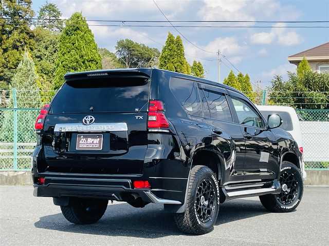 トヨタ ランドクルーザー プラド TX 愛知県 2019(平31)年 6.6万km ブラック AIS検査済み/ワンオーナ/モデリスタアンダーエアロ（前後）/寒冷地仕様/エンジンスターター/BRUT BR-55 新品アルミ/ダヴァンティ テラトゥーラ（ホワイトレター）265/65-18/サイドステップ/ボンネットエンブレム/LXグリル（社外）ー/純正オーディオ/USB:AUX:CD/ウッドコンビハンドル/バックフォグ/オートマチックハイビーム/保証書/取扱説明書/【2406047679】