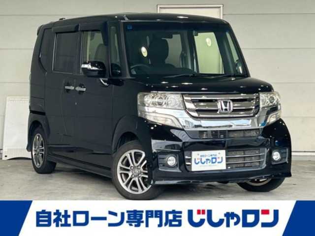 ホンダ Ｎ ＢＯＸ カスタム G Lパッケージ 沖縄県 2015(平27)年 6.7万km 黒 (株)IDOMが運営する【じしゃロンコザ店】の自社ローン専用車両になりますこちらは現金またはオートローンご利用時の価格です。自社ローンご希望の方は別途その旨お申付け下さい/フルセグナビ　/ＥＴＣ　/スマートキー　/プッシュスタート　/パワーウィンドウ　/パワーステアリング　/バックカメラ　/ドライブレコーダー前方　/純正アルミホイール　/純正フロアマット　/Ｂｌｕｅｔｏｏｔｈ接続