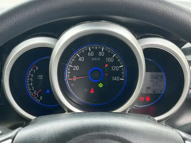 ホンダ Ｎ ＢＯＸ カスタム G Lパッケージ 沖縄県 2015(平27)年 6.7万km 黒 (株)IDOMが運営する【じしゃロンコザ店】の自社ローン専用車両になりますこちらは現金またはオートローンご利用時の価格です。自社ローンご希望の方は別途その旨お申付け下さい/フルセグナビ　/ＥＴＣ　/スマートキー　/プッシュスタート　/パワーウィンドウ　/パワーステアリング　/バックカメラ　/ドライブレコーダー前方　/純正アルミホイール　/純正フロアマット　/Ｂｌｕｅｔｏｏｔｈ接続