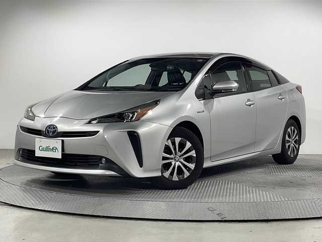 トヨタ プリウス A プレミアム 広島県 2019(平31)年 5万km シルバーM ALPINE９型ナビ/バックカメラ/温/冷シート/パワーシート(運転席)/パーキングアシスト/ブラインドスポットモニター/ヘッドアップディスプレイ/レーダークルーズコントロール/ＨＤＭＩ/1500W給電/前方ドラレコ/ＥＴＣ/オートマチックハイビーム/レーンキープ/衝突軽減/踏み間違い防止/コーナーセンサー/フルセグ/純正15インチホイールカバー(195/65/R15)/エアバッグ(運転席/助手席/サイド/カーテン)