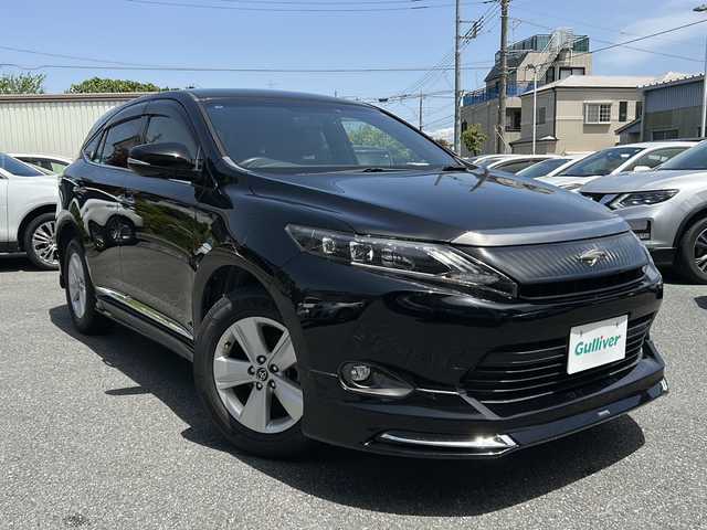 トヨタ ハリアー エレガンス 埼玉県 2014(平26)年 5.1万km ブラック ワンオーナー/モデリスタエアロ/社外ナビ/・AM/FM/CD/DVD/BT/フルセグTV/ETC/ハーフレザーシート/D席パワーシート/HIDヘッドライト/フォグランプ/ウインカーミラー/前方ドライブレコーダー/プッシュスタート/スマートキー/保証書/取扱説明書