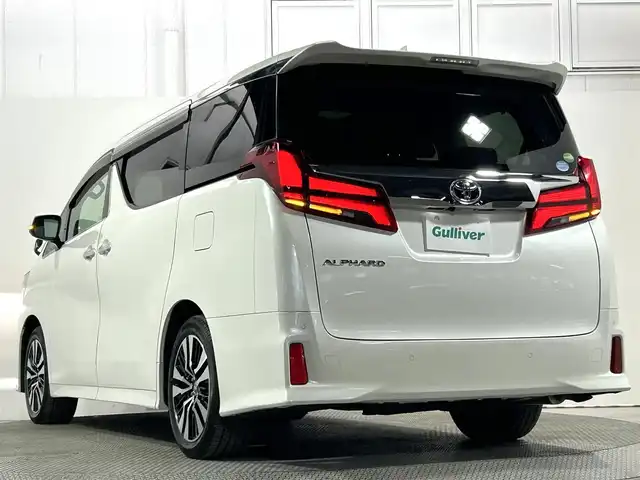 トヨタ アルファード S Cパッケージ 大阪府 2019(令1)年 2.5万km ホワイトパールクリスタルシャイン サンルーフ 黒革 純正10incナビTV バックカメラ フリップダウンモニター パワーシート/ヒーター/エアコン ステアリングヒーター 電動リアゲート レーダークルコン 衝突軽減B レーンアシスト 100V電源