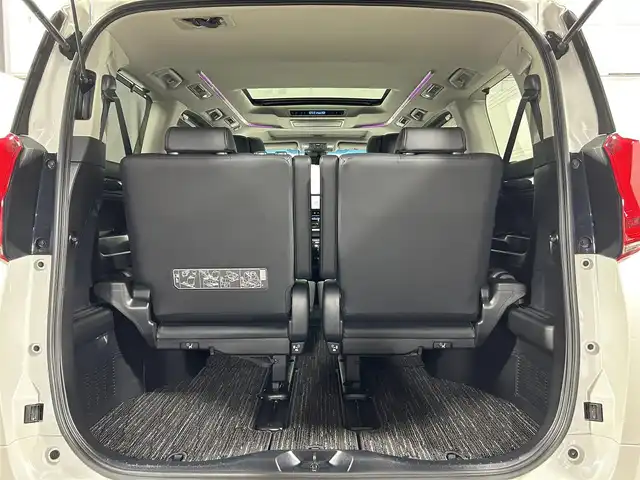 トヨタ アルファード S Cパッケージ 大阪府 2019(令1)年 2.5万km ホワイトパールクリスタルシャイン サンルーフ 黒革 純正10incナビTV バックカメラ フリップダウンモニター パワーシート/ヒーター/エアコン ステアリングヒーター 電動リアゲート レーダークルコン 衝突軽減B レーンアシスト 100V電源