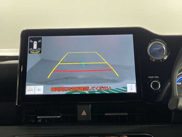 トヨタ ヴォクシー ハイブリッド S－Z 神奈川県 2022(令4)年 1.9万km ホワイトパールクリスタルシャイン 電動サイドステップ/モデリスタスポイラー/純正10.5型ディスプレイオーディオプラス/CD DVD　フルセグ/Bluetooth　USB　HDMI/バックカメラ/両側電動スライドドア/パワーバックドア/AC100V/ETC2.0/快適利便パッケージHigh/ブラインドスポットモニター/セーフティセンス/プリクラッシュセーフティ/レーントレーシングアシスト/レーンディパーチャーアラート/レーダークルーズコントロール/オートマチックハイビーム/ロードサインアシスト/ドライバー異常時対応システム/プロアクティブドライビングアシスト/発進遅れ告知/レーンチェンジアシスト/リアクロストラフィックアラート/パーキングサポートブレーキ/安心降車アシスト/アドバンストドライブ/リヤシートマインダー/後退速度抑制/緊急時操舵支援/前後ソナー/ナノイーX/ハーフレザーシート/2列目オットマン/前席/2列目シートヒーター/革巻きステアリング/ステアリングヒーター/プッシュスタート/スマートキー/純正17インチアルミホイール/LEDヘッドランプ