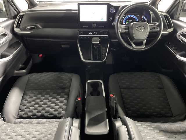 トヨタ ヴォクシー ハイブリッド S－Z 神奈川県 2022(令4)年 1.9万km ホワイトパールクリスタルシャイン 電動サイドステップ/モデリスタスポイラー/純正10.5型ディスプレイオーディオプラス/CD DVD　フルセグ/Bluetooth　USB　HDMI/バックカメラ/両側電動スライドドア/パワーバックドア/AC100V/ETC2.0/快適利便パッケージHigh/ブラインドスポットモニター/セーフティセンス/プリクラッシュセーフティ/レーントレーシングアシスト/レーンディパーチャーアラート/レーダークルーズコントロール/オートマチックハイビーム/ロードサインアシスト/ドライバー異常時対応システム/プロアクティブドライビングアシスト/発進遅れ告知/レーンチェンジアシスト/リアクロストラフィックアラート/パーキングサポートブレーキ/安心降車アシスト/アドバンストドライブ/リヤシートマインダー/後退速度抑制/緊急時操舵支援/前後ソナー/ナノイーX/ハーフレザーシート/2列目オットマン/前席/2列目シートヒーター/革巻きステアリング/ステアリングヒーター/プッシュスタート/スマートキー/純正17インチアルミホイール/LEDヘッドランプ