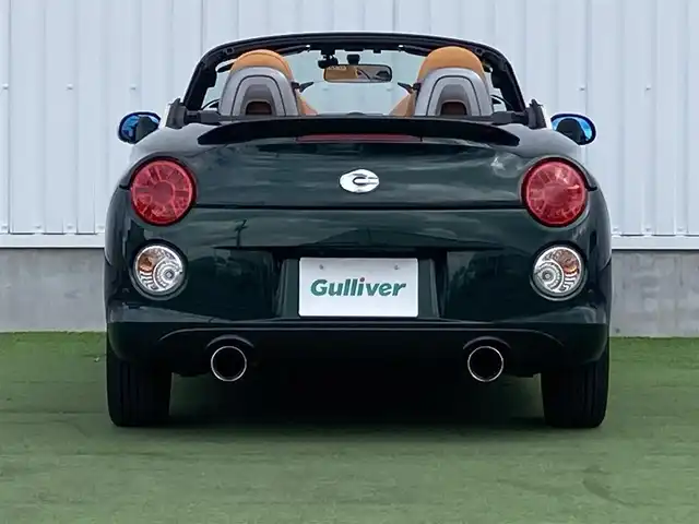 ダイハツ コペン セロS 香川県 2019(平31)年 4.2万km ブリティッシュグリーンマイカ 登録時走行距離：41172km/ディーラー純正SDナビ/　CD DVD BT フルセグTV/バックカメラ/コーナーセンサー/ビルシュタインサスペンション/HKSマフラー/LEDヘッドライト/オートライト/フォグランプ/MTモード付AT/パドルシフト/革調シートカバー/シートヒーター/ETC/前方ドライブレコーダー/革巻きステアリング/ステアリングスイッチ/アイドリングストップ/横滑り防止装置/プッシュスタート/スマートキー