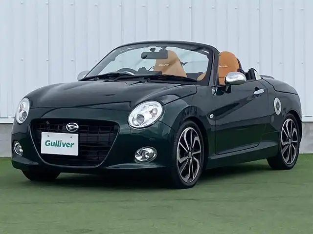 ダイハツ コペン セロS 香川県 2019(平31)年 4.2万km ブリティッシュグリーンマイカ 登録時走行距離：41172km/ディーラー純正SDナビ/　CD DVD BT フルセグTV/バックカメラ/コーナーセンサー/ビルシュタインサスペンション/HKSマフラー/LEDヘッドライト/オートライト/フォグランプ/MTモード付AT/パドルシフト/革調シートカバー/シートヒーター/ETC/前方ドライブレコーダー/革巻きステアリング/ステアリングスイッチ/アイドリングストップ/横滑り防止装置/プッシュスタート/スマートキー