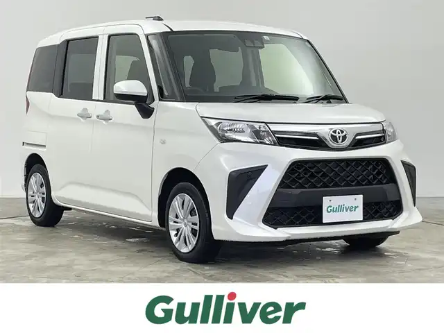 トヨタ ルーミー X 千葉県 2023(令5)年 1.2万km パールホワイトⅢ 禁煙車/トヨタセーフティセンス/・クリアランスソナー/片側電動ドア/純正メモリナビ/・型番：NMZK-W73D/・CD/DVD/USB/Bluetooth/フルセグTV/・バックカメラ/DNシートヒーター/ステアリングスイッチ/社外フロアマット/純正ホイールキャップ/オートライト/・ハロゲンヘッドライト/・ヘッドライトレベライザー/プッシュスタート/・スマートキー/・スペアキー