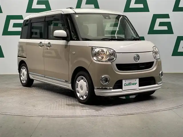 ダイハツ ムーヴ キャンバス X LTD メイクアッフ SA Ⅱ 鹿児島県 2017(平29)年 3.9万km パールホワイトⅢ/ナチュラルベージュマイカメタリック 2トーン 社外ナビ【ＭＤＶＤ５０４ＢＴＷ】　/フルセグＴＶ　/Ｂｌｕｅｔｏｏｔｈ　/バックカメラ　/スマートアシストII　/両側パワースライドドア　/コーナーセンサー　/ハロゲンヘッドライト　/純正ドアバイザー　/ＥＴＣ　/レザー調シートカバー【Clazzio】/禁煙