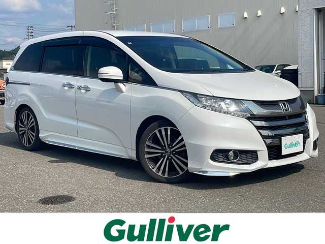 ホンダ オデッセイ アブソルート EX 秋田県 2014(平26)年 11.4万km ホワイトオーキッドパール 純正ナビ/全方位カメラ/ETC/純正18インチアルミ/オットマン/両側パワースライドドア
