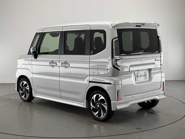 スズキ スペーシア カスタム HYBRID XS 宮崎県 2024(令6)年 0.4万km ピュアホワイトP 禁煙車/衝突被害軽減ブレーキ/純正9型ディスプレイオーディオナビTV/（Bluetooth/USB/HDMI/FMAM/フルセグTV)/純正LEDオートライト/純正LEDフォグ/純正15インチアルミ/純正エアロ/純正ルーフエンドスポイラー/両側電動スライドドア/アダプティブクルーズコントロール/レーンディパーチャーアラート/クリアランスソナー/ヘッドアップディスプレイ/エネチャージ/オートエアコン/前席シートヒーター/ステアリングヒーター/ハーフレザーシート/本革巻ハンドル/スマートキー/プッシュエンジンスタート/新車時保証書/取扱い説明書