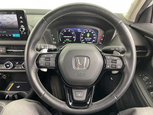 ホンダ ＺＲ－Ｖ ハイブリッド e:HEV Z 愛知県 2023(令5)年 2.9万km プラチナホワイトパール 禁煙車/純正9インチナビ/（AM/FM/Bluetooth/USB/フルセグTV）/全方位カメラ/BOSEサウンド/シーケンシャルウインカー/ワイヤレス充電/ホンダセンシング/・衝突軽減ブレーキ/・レーンキープアシスト/・アダプティブクルーズコントロール/・トラフィックジャムアシスト/・誤発進抑制機能/・パーキングセンサー/・オートハイビーム/・ブラインドスポットインフォメーション/ETC2.0/前後ドライブレコーダー/レザシート/パワーシート/メモリシート/シートヒーター/革巻きステアリング/ステアリングヒーター/パワーバックドア/ダウンヒルアシスト/純正18インチアルミホイール/スマートキー/プッシュスタート/LEDヘッドライト/オートライト/純正フロアマット/横滑り防止装置/電動格納ミラー/電子パーキングぶらーき/オートホールド