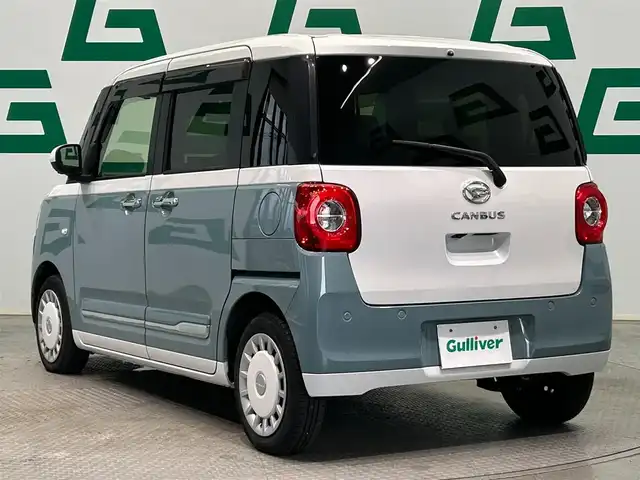 ダイハツ ムーヴ キャンバス ストライプス G ターボ 鹿児島県 2022(令4)年 2.9万km シャイニングホワイトパール/レイクブルーメタリック ワンオーナー　/禁煙車　/純正ディスプレイオーディオ　/全方位カメラ　/スマートアシスト　/・衝突警報/・衝突回避ブレーキ/・誤発進抑制機能（前後）/・車線逸脱警報/・先行車発進お知らせ機能/両側パワースライドドア　/前後コーナーセンサー　/前席シートヒーター　/ホッとカップホルダー/置くだけ充電/純正フロアマット　/ＬＥＤヘッドライト　/ＥＴＣ　/前後ドライブレコーダー/オートライト/オートマチックハイビーム/ドアバイザー