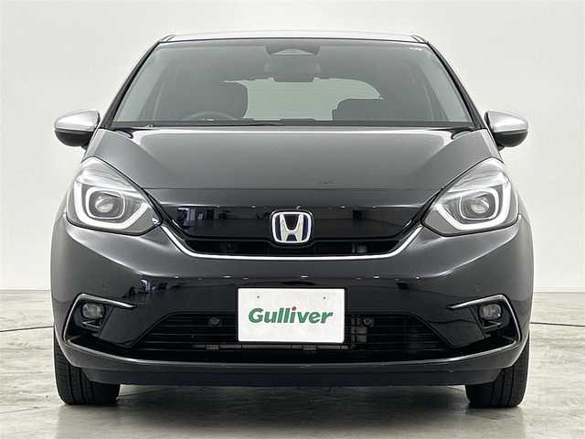 ホンダ フィット e:HEVリュクス 福岡県 2020(令2)年 8万km クリスタルブラックパール 純正８型ナビ(CD DVD BT フルセグTV) /バックカメラ /ETC　/シティブレーキシステム /レーンキープアシスト　/オートハイビーム　/レーダークルーズコントロール　/コーナーセンサー　/ハーフレザーシート　/シートヒーター　/オートライト /LEDヘッドライト　/フォグランプ