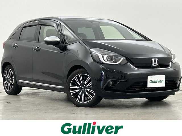 ホンダ フィット e:HEVリュクス 福岡県 2020(令2)年 8万km クリスタルブラックパール 純正８型ナビ(CD DVD BT フルセグTV) /バックカメラ /ETC　/シティブレーキシステム /レーンキープアシスト　/オートハイビーム　/レーダークルーズコントロール　/コーナーセンサー　/ハーフレザーシート　/シートヒーター　/オートライト /LEDヘッドライト　/フォグランプ