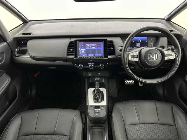 ホンダ フィット e:HEVリュクス 福岡県 2020(令2)年 8万km クリスタルブラックパール 純正８型ナビ(CD DVD BT フルセグTV) /バックカメラ /ETC　/シティブレーキシステム /レーンキープアシスト　/オートハイビーム　/レーダークルーズコントロール　/コーナーセンサー　/ハーフレザーシート　/シートヒーター　/オートライト /LEDヘッドライト　/フォグランプ