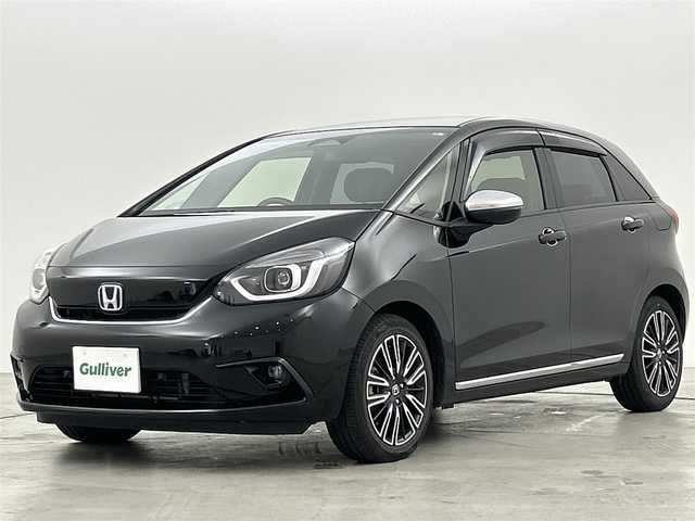ホンダ フィット e:HEVリュクス 福岡県 2020(令2)年 8万km クリスタルブラックパール 純正８型ナビ(CD DVD BT フルセグTV) /バックカメラ /ETC　/シティブレーキシステム /レーンキープアシスト　/オートハイビーム　/レーダークルーズコントロール　/コーナーセンサー　/ハーフレザーシート　/シートヒーター　/オートライト /LEDヘッドライト　/フォグランプ