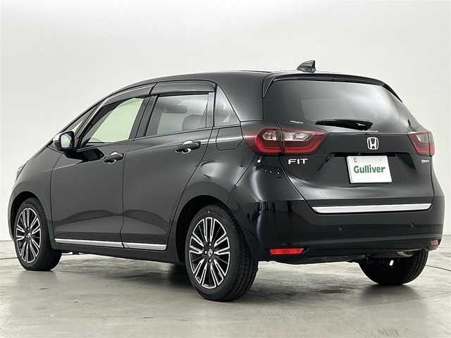 ホンダ フィット e:HEVリュクス 福岡県 2020(令2)年 8万km クリスタルブラックパール 純正８型ナビ(CD DVD BT フルセグTV) /バックカメラ /ETC　/シティブレーキシステム /レーンキープアシスト　/オートハイビーム　/レーダークルーズコントロール　/コーナーセンサー　/ハーフレザーシート　/シートヒーター　/オートライト /LEDヘッドライト　/フォグランプ