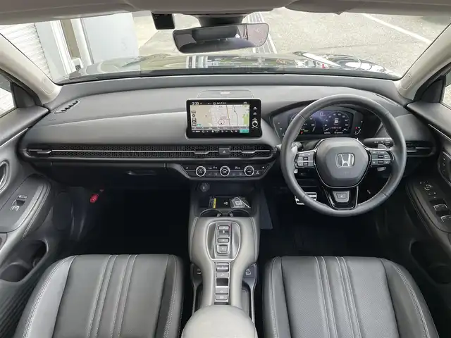 ホンダ ＺＲ－Ｖ ハイブリッド e:HEV Z 東京都 2024(令6)年 0.7万km クリスタルブラックパール ホンダコネクトナビ/マルチビューカメラ/衝突被害軽減/路外逸脱抑制/アダプティブクルーズコントロール/ブラインドスポット/ＥＴＣ/ドライブレコーダー/パワーバックドア/ワイヤレス充電器