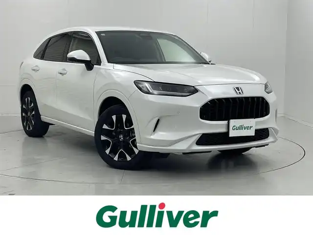 ホンダ ＺＲ－Ｖ ハイブリッド e:HEV Z 茨城県 2023(令5)年 2.1万km プラチナホワイトパール Honda SENSING/BOSEプレミアムサウンドシステム/純正ナビ/ディスプレイオーディオ/全周囲カメラ/フルセグTV/AppleCarPlay/Android Auto/レザーシート/シートヒーター/パワーシート/LEDヘッドライト/アイドリングストップ/オートホールド/電動バックドア/ステアリングヒーター/パドルシフト/ドライブレコーダー/ビルトインETC2.0/置き型充電/純正18インチAW