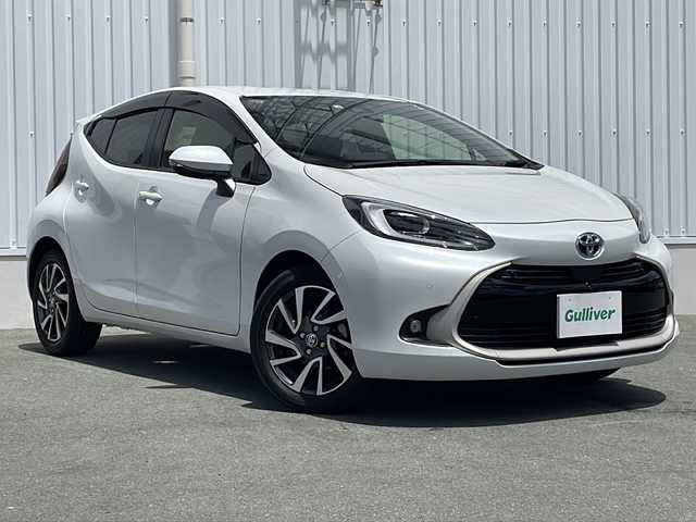 トヨタ アクア Z 三重県 2022(令4)年 4.5万km プラチナホワイトパールマイカ 純正１０．５型ナビ　/全周囲カメラ　/アドバンスドパーク　/ＡＣ１００Ｖ電源　/USB-タイプC給電ポート/ＨＵＤ　/純正ビルトインＥＴＣ２．０　/社外前後ドライブレコーダー　/衝突軽減システム　/レーンキープアシスト　/追従走行　/BSM/電動格納ミラー/禁煙車