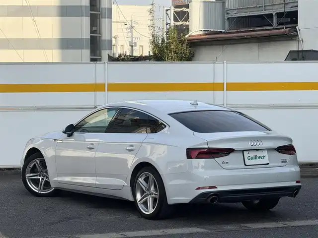 アウディ Ａ５ SB2．0TFSI Q スポーツ 愛知県 2017(平29)年 2万km グレイシアホワイトメタリック /正規ディーラー車//禁煙車//7速Sトロニック//Sラインパッケージ//マトリクスLED//バーチャルコックピット//MMIナビ//フルセグ/BT/CD/DVD/MSV/SD/USB/AUX//バックカメラ//ETC2.0//前後ドライブレコーダー//ハーフレザーシート//パワーシート//ランバーサポート//シートヒーター//電動リアゲート//アウディプレセンス//アクティブレーンアシスト//渋滞アシスト//レーダークルーズコントロール//パーキングエイド//エフィシエンシアシスト//アウディドライブセレクト//Efficiency/Comfort/Dynamic/Individual//ESC//パドルシフト//MTモード付きAT//純正18インチアルミホイール//スピードリミッター//アイドリングストップ//シーケンシャルウィンカー//ハイビームアシスト//リアフォグランプ//デイライムランニングライト//オールウェザーライト//カミング・リービングホームライト//プッシュスタート//スペアスマートキー//革巻きステアリング//ステアリングリモコン//チルト＆テレスコピックステアリング//純正フロアマット//トノカバー//レインセンサー//オートリトラクタブルウィンカーミラー//保証書/取扱説明書//D記録簿H30.R1.5.6