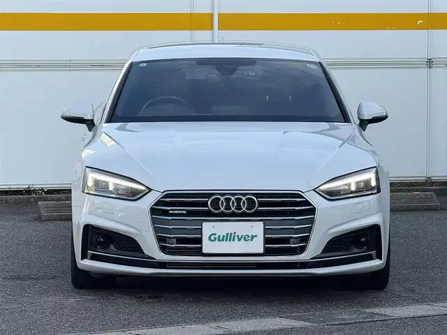 アウディ Ａ５ SB2．0TFSI Q スポーツ 愛知県 2017(平29)年 2万km グレイシアホワイトメタリック /正規ディーラー車//禁煙車//7速Sトロニック//Sラインパッケージ//マトリクスLED//バーチャルコックピット//MMIナビ//フルセグ/BT/CD/DVD/MSV/SD/USB/AUX//バックカメラ//ETC2.0//前後ドライブレコーダー//ハーフレザーシート//パワーシート//ランバーサポート//シートヒーター//電動リアゲート//アウディプレセンス//アクティブレーンアシスト//渋滞アシスト//レーダークルーズコントロール//パーキングエイド//エフィシエンシアシスト//アウディドライブセレクト//Efficiency/Comfort/Dynamic/Individual//ESC//パドルシフト//MTモード付きAT//純正18インチアルミホイール//スピードリミッター//アイドリングストップ//シーケンシャルウィンカー//ハイビームアシスト//リアフォグランプ//デイライムランニングライト//オールウェザーライト//カミング・リービングホームライト//プッシュスタート//スペアスマートキー//革巻きステアリング//ステアリングリモコン//チルト＆テレスコピックステアリング//純正フロアマット//トノカバー//レインセンサー//オートリトラクタブルウィンカーミラー//保証書/取扱説明書//D記録簿H30.R1.5.6